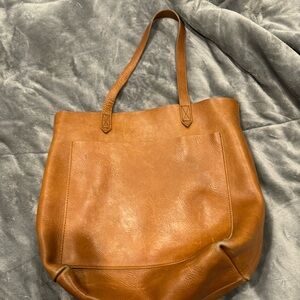 Madewell shoulder bag. Small ink spot on outside pocket.